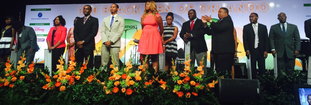Bryant speaking at 100 Black Men of Orlando