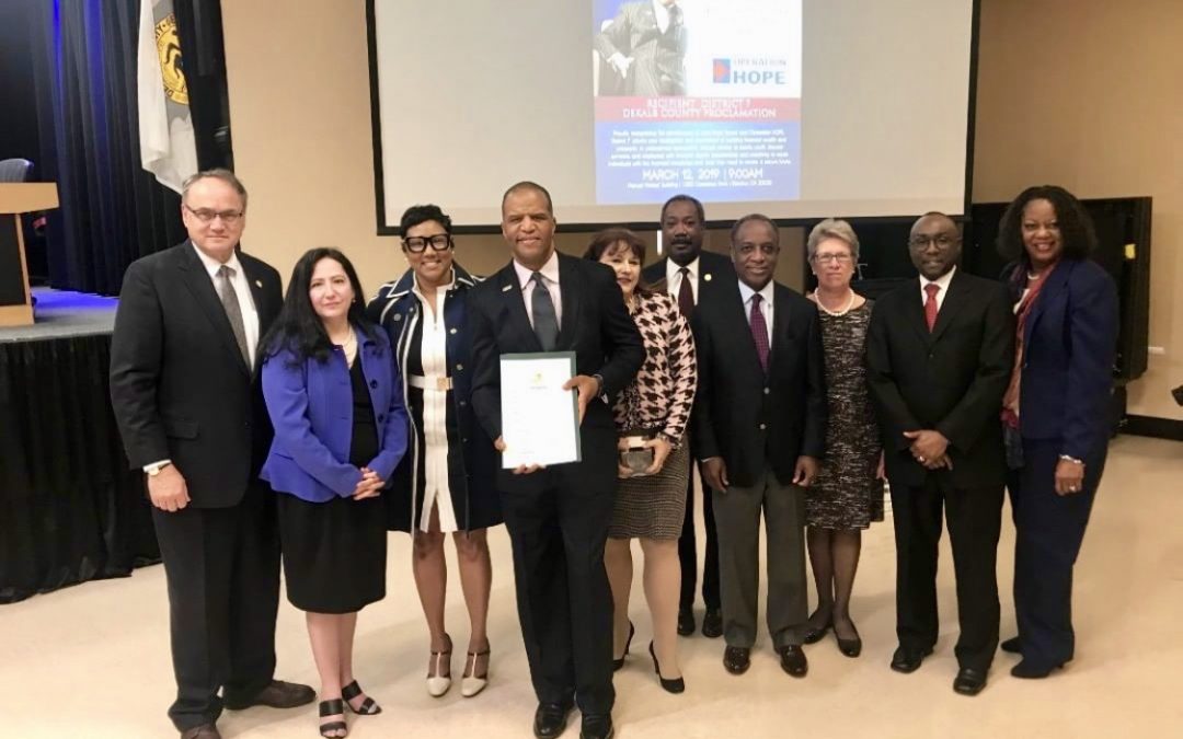 DeKalb County Board of Commissioners recognize the work of Operation HOPE, and the investment by the Promise Homes Company with County Proclamation.